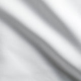 Detailaufnahme des weißen Stoffs - langlebige, pflegeleichte Tischwäsche für gehobene Gastronomie