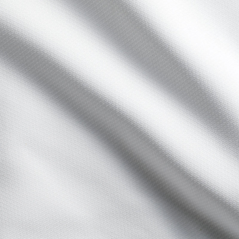 Detailaufnahme des weißen Stoffs - langlebige, pflegeleichte Tischwäsche für gehobene Gastronomie